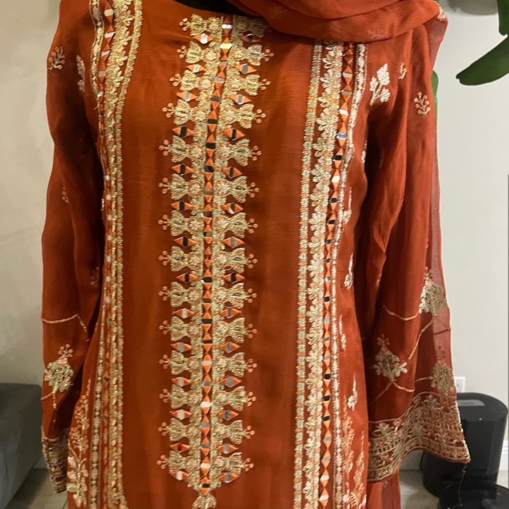 Orange chifon salwar kamis never worn with design ans beautiful stone work